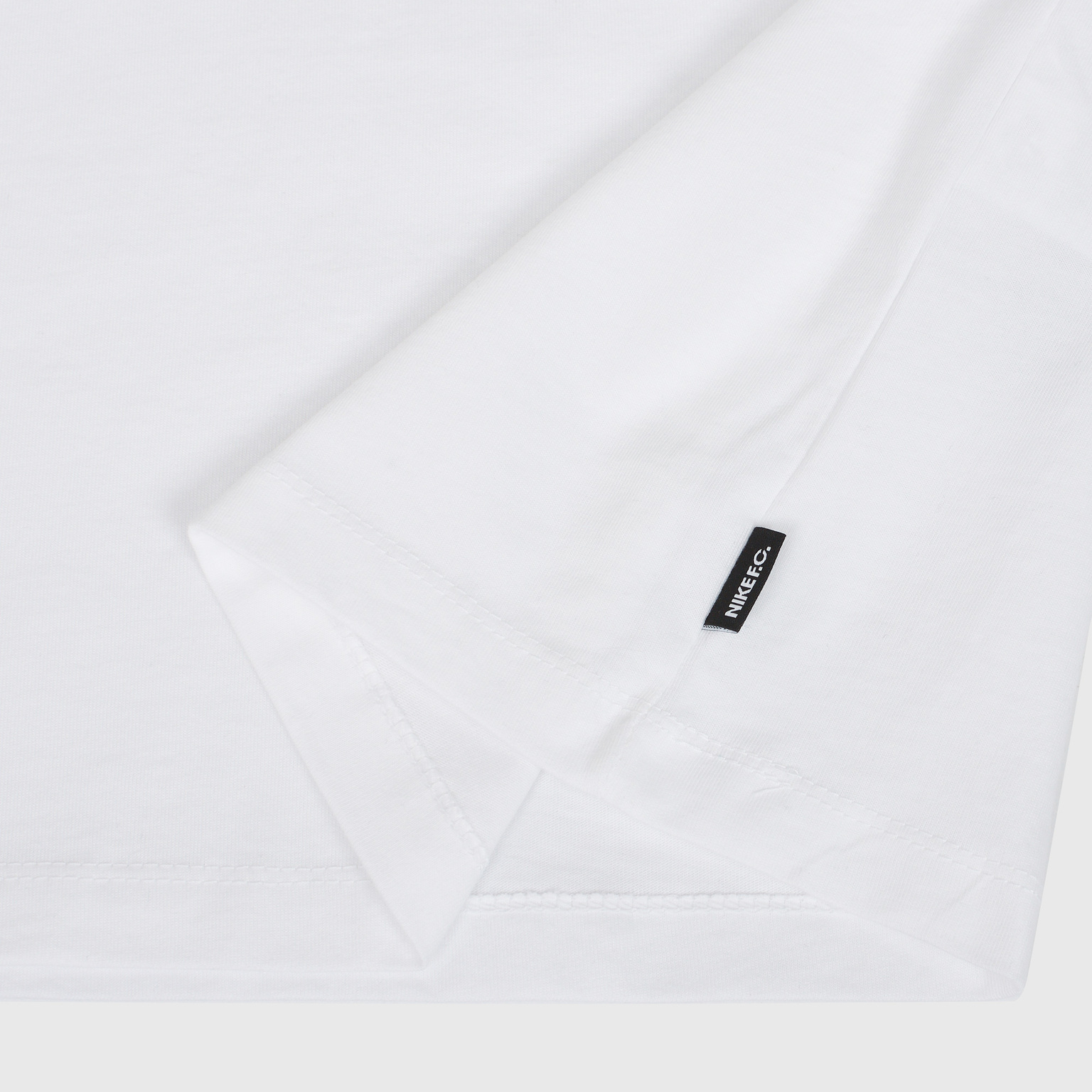 Футболка Nike F.C. Tee Seasonal Block DH7444-100