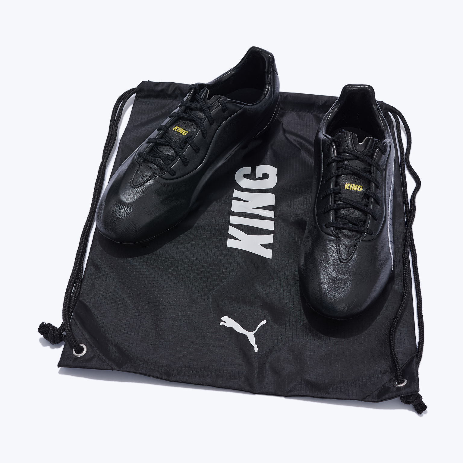 Бутсы Puma King Platinum FG/AG 10902602